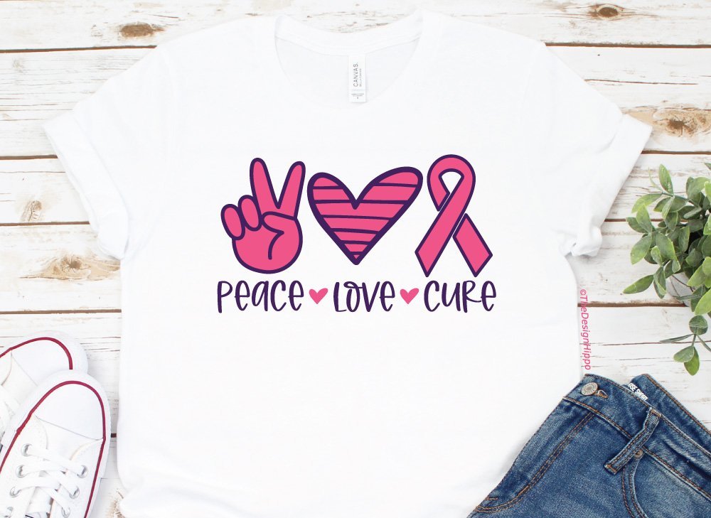 peace love cure design displayed on a white t-shirt made with Cricut vinyl