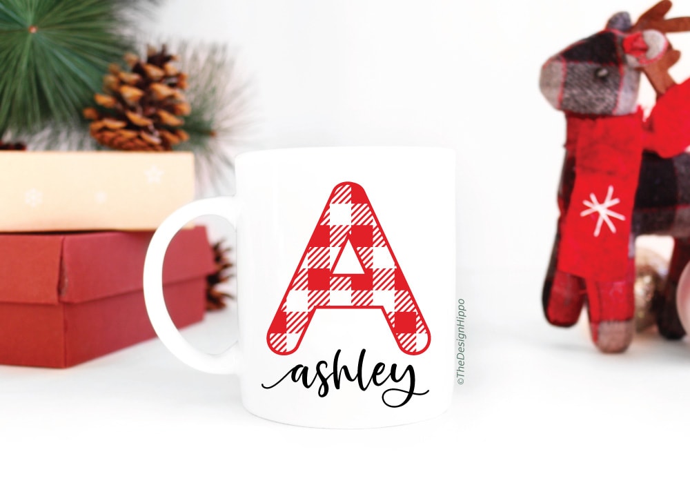 white mug with a letter "A" in a colorful Christmas background