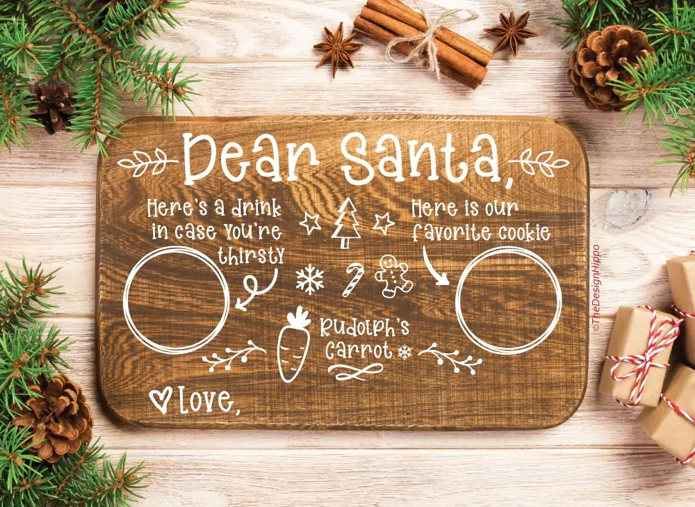 display of free Santa cookie tray SVG design on a wooden serving tray made using a Cricut machine.