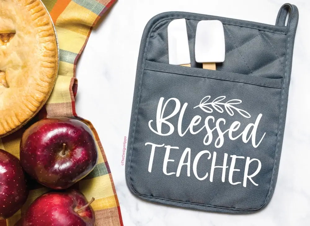 blessed teacher design displayed on a pot holder made using Cricut cutting machine