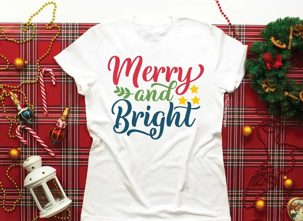 colorful merry and bright design mocked up on a white t-shirt