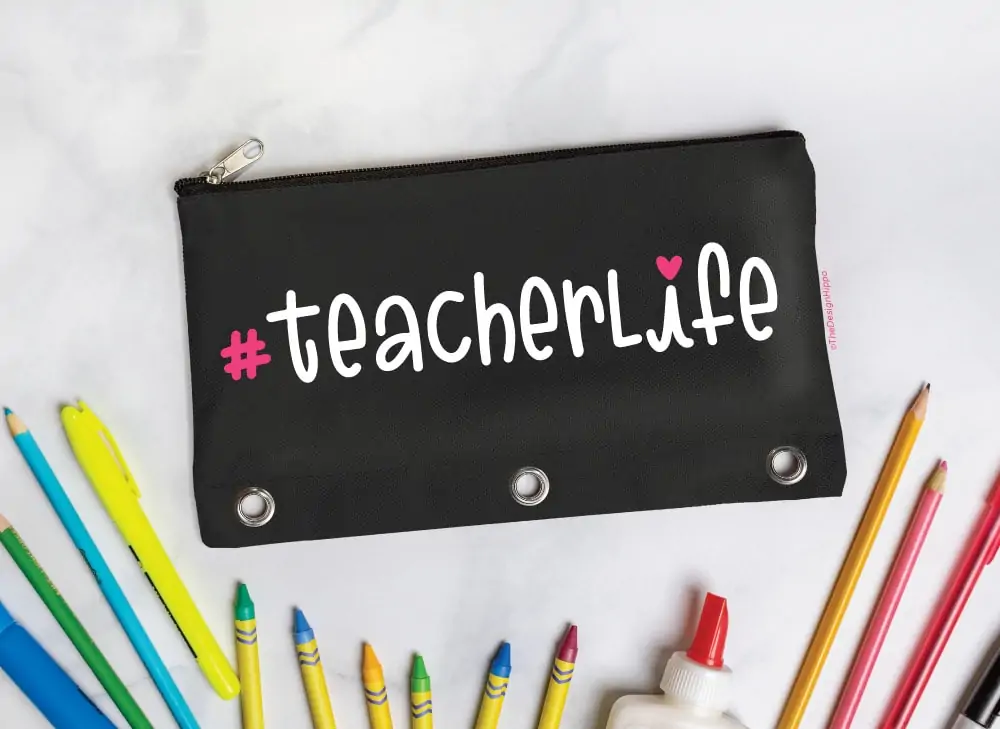 a cute teacher life SVG image displayed on a pencil pouch