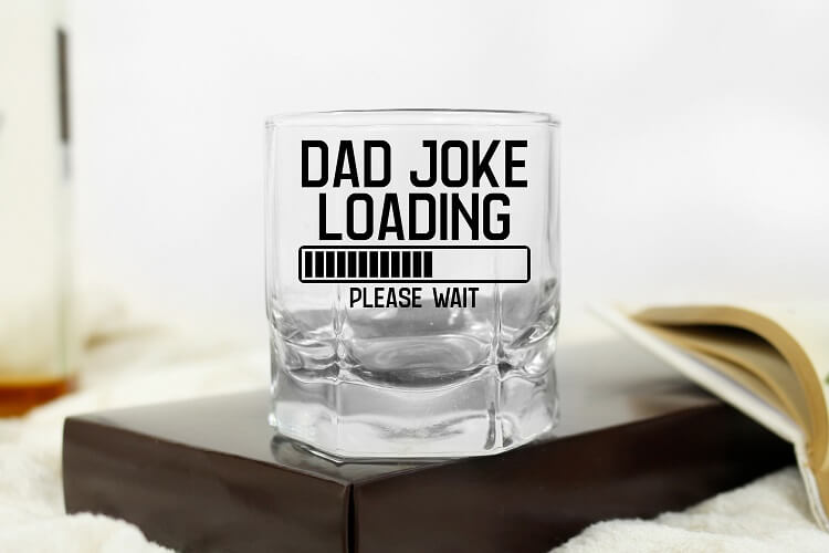 whiskey glass featuring a funny dad quote made with cricut maker