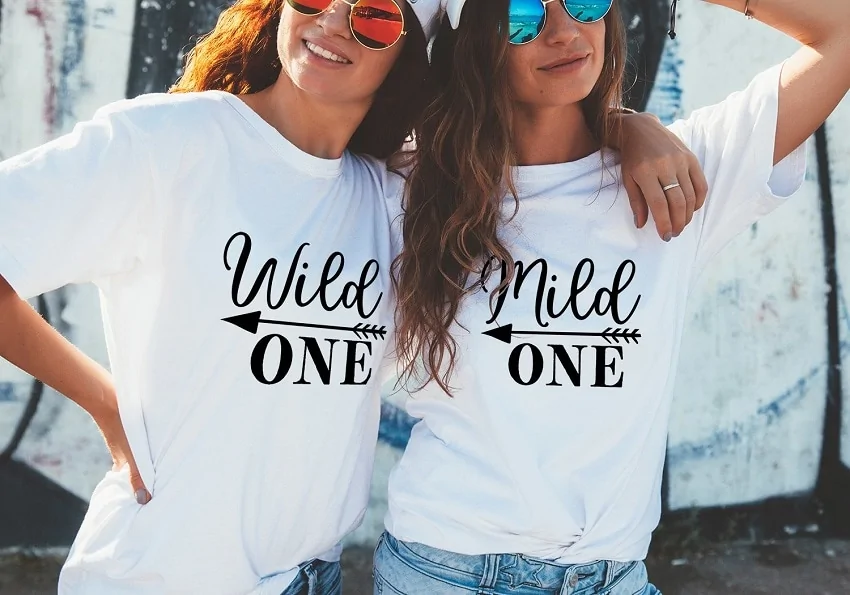 best friends wearing funny quote t-shirts