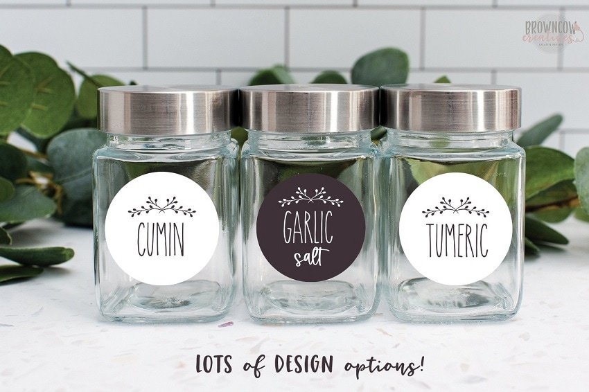 three clear glass jars with spice labels made with cricut