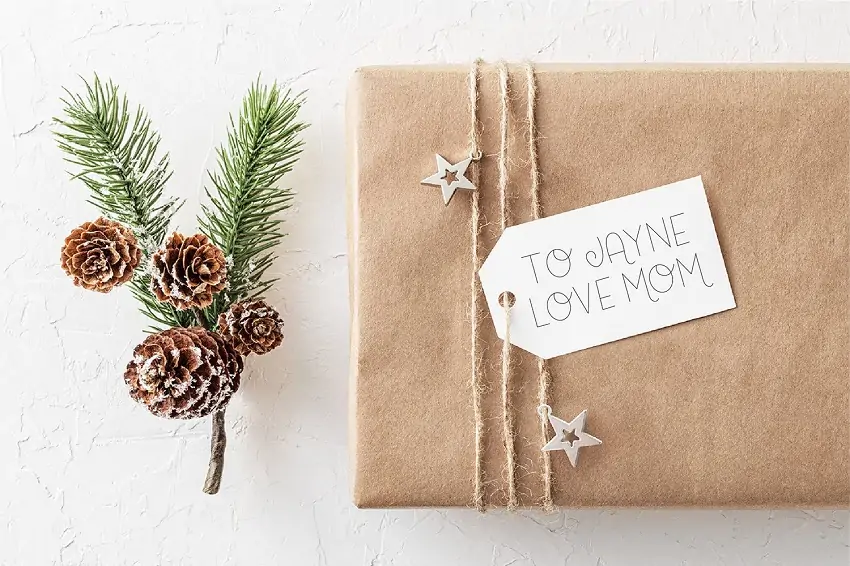display of an elegant font "Christmas Cards" on a gift tag