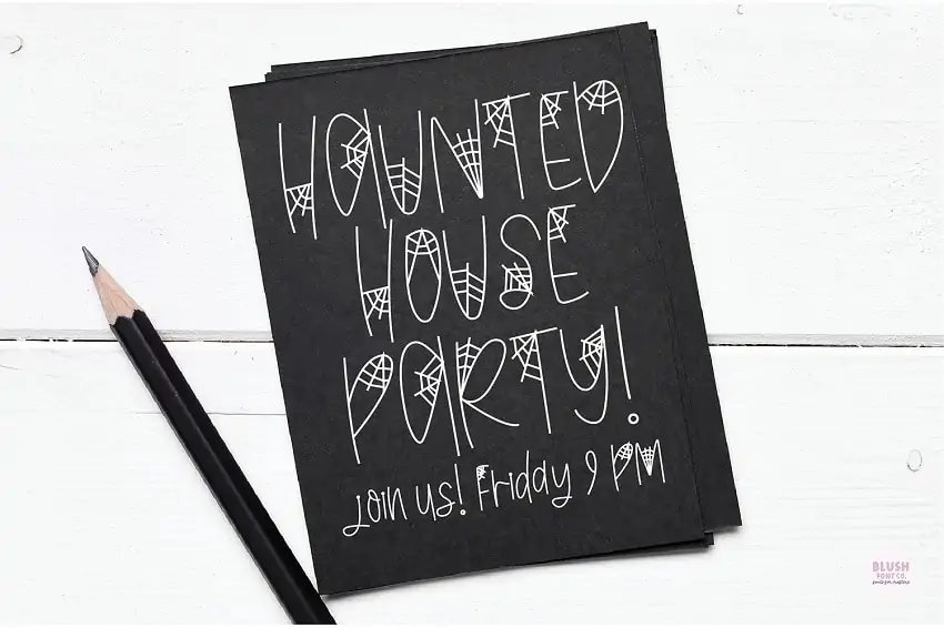 display of "Black Widow" font on a party invite for Halloween