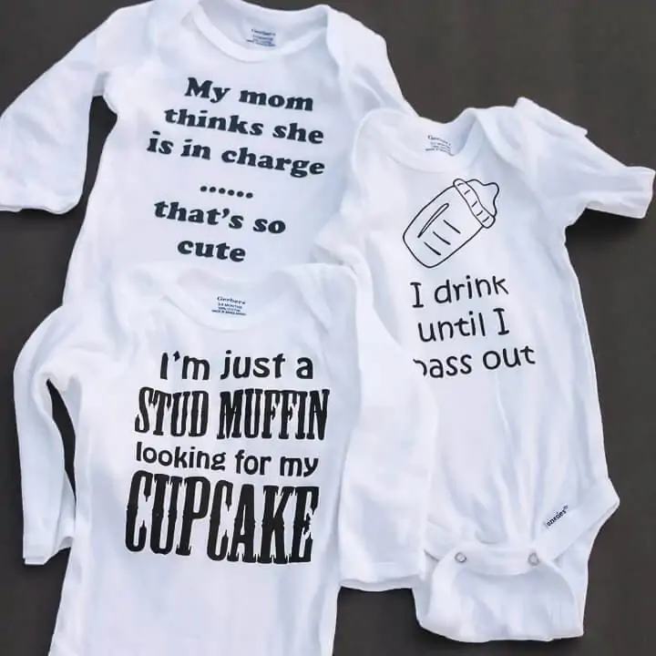 funny baby svg designs displayed on three onesies 