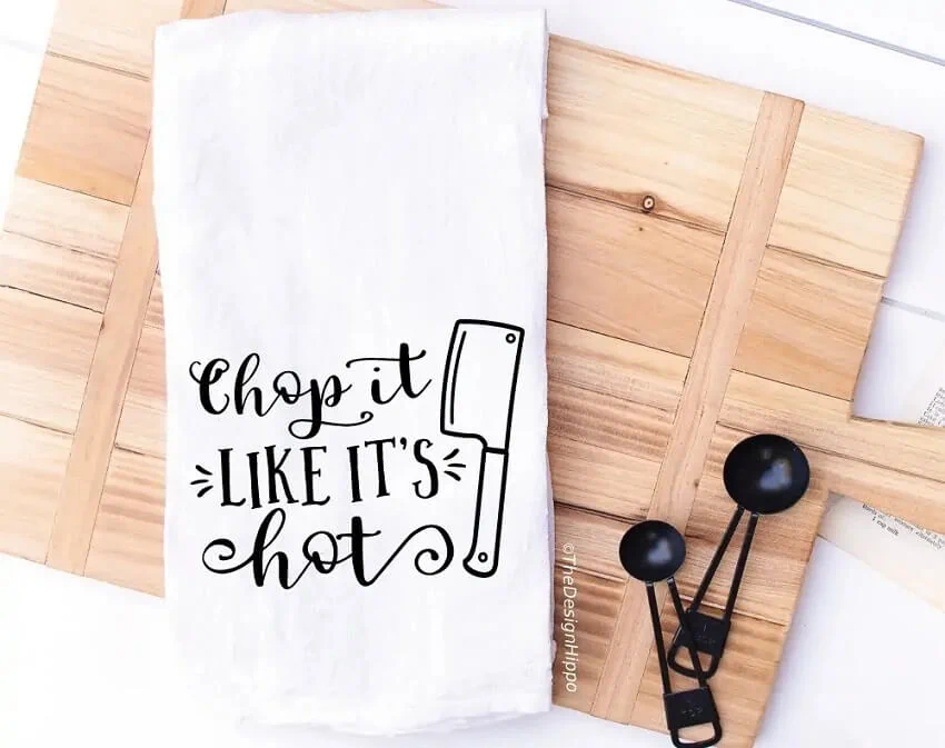 funny kitchen SVG quote design displayed on a kitchen towel