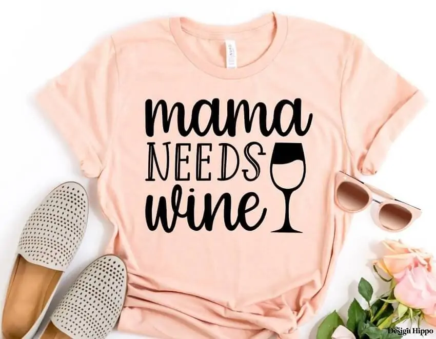 funny mom svg design - mama needs wine quote mocked up on a shirt