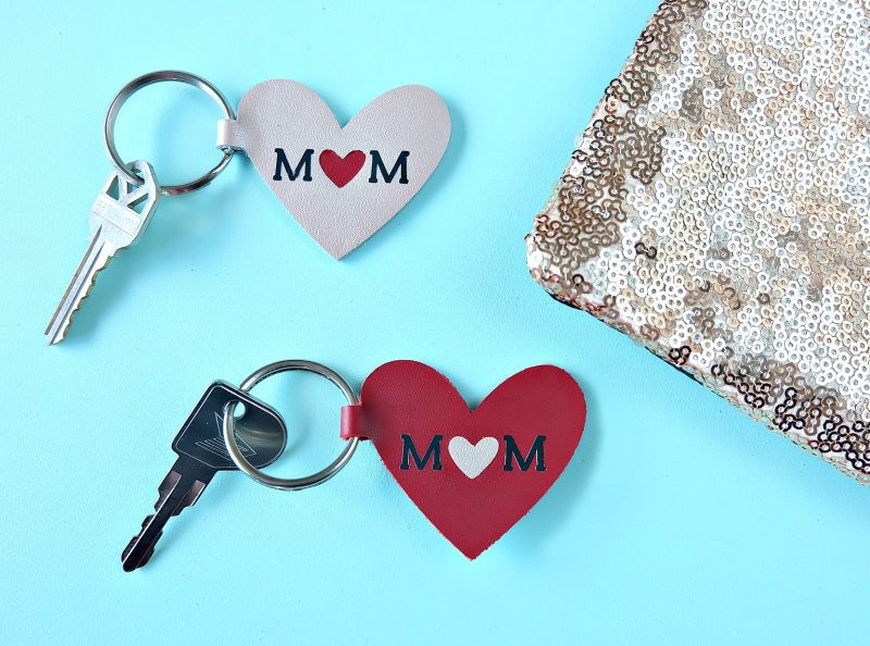 display of two heart shaped Cricut faux leather keychain projects
