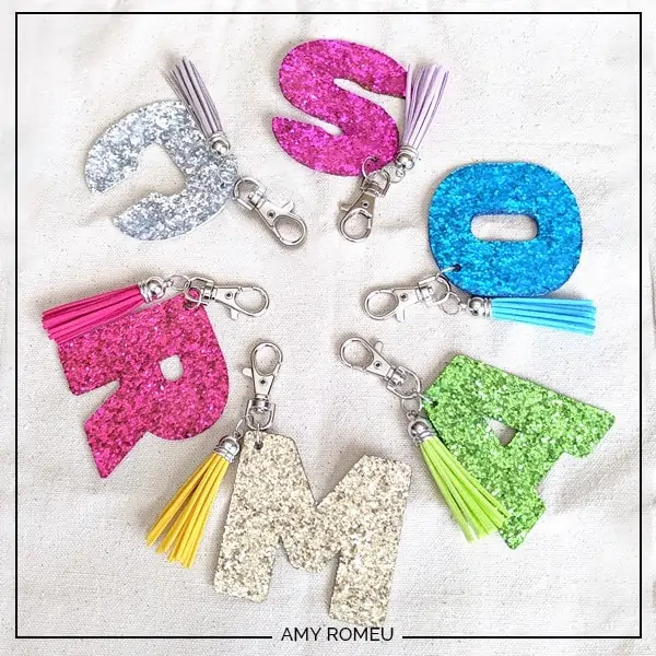 display of custom Cricut keychains made with glitter
