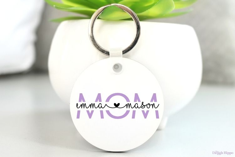 white circle keychain with mom split monogram design made with Cricut Maker