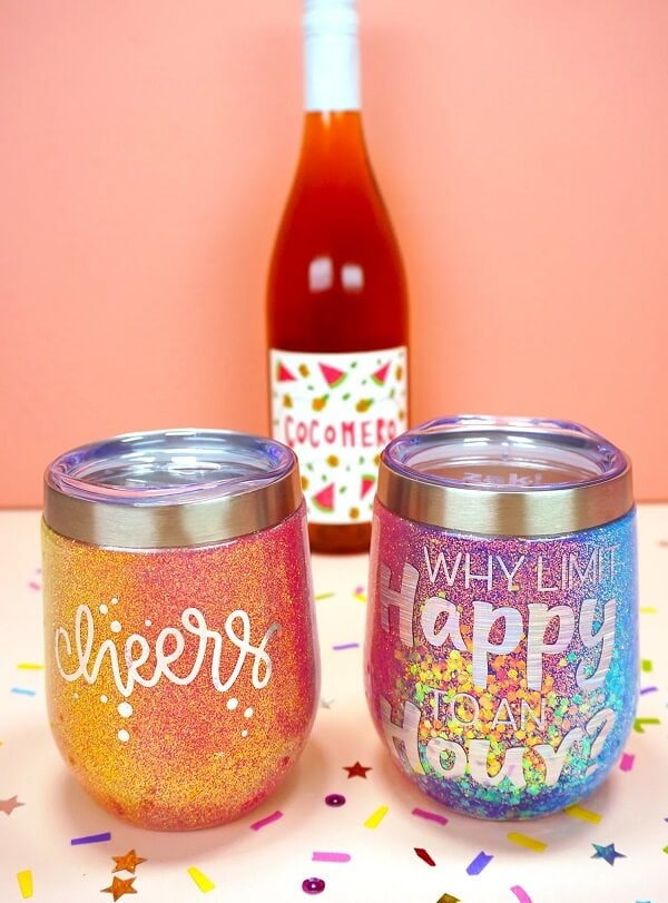 display of two glitter wine tumbler ideas for Cricut