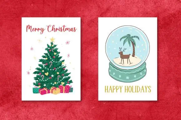 display of two Christmas greeting card designs made using Welcome Holiday font