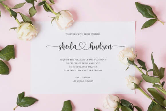 display of a wedding invitation designed using Hello Honey font