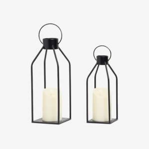 Set of two black metal lanterns with glass panels