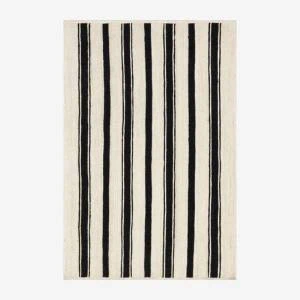 Black and white striped area rug with contemporary pattern