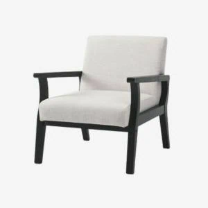 White upholstered accent chair with black wooden frame in modern farmhouse style