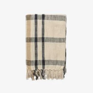 Beige and black plaid throw blanket with fringe