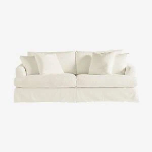 Casual white slipcovered two-cushion sofa