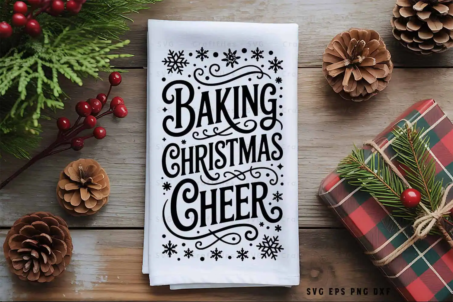 white kitchen towel that says Baking Christmas Cheer with snowflakes