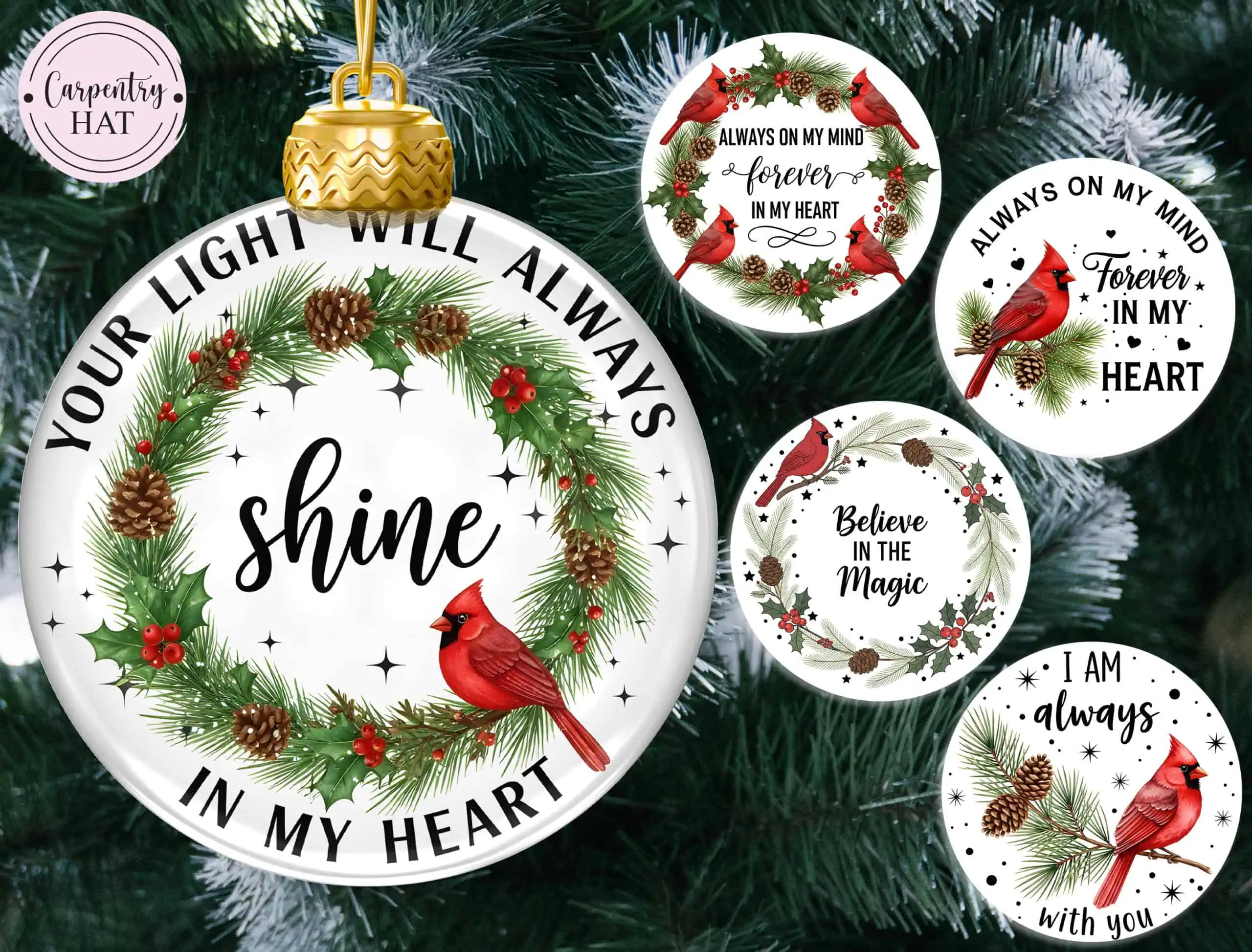 clear ornament with a holly and pinecone wreath, a red cardinal and the words your light will always shine in my heart, with four more cardinal memorial designs