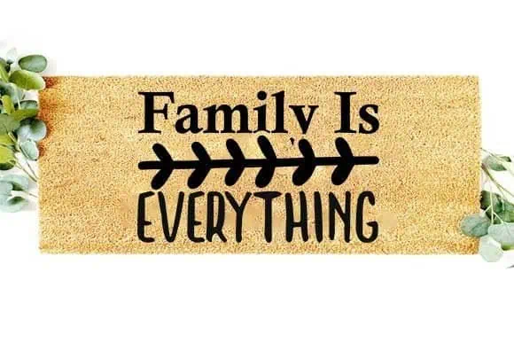 coir doormat painted with family is everything in black letters