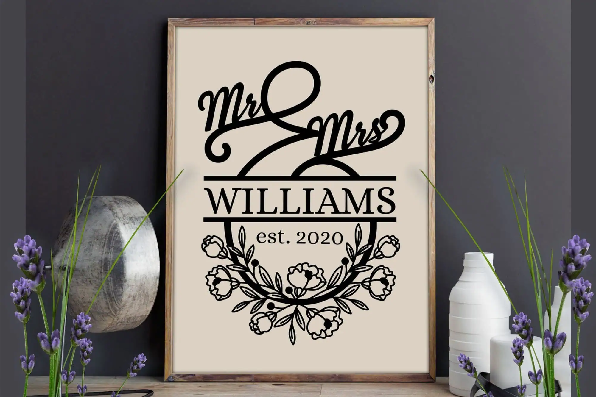framed sign that says Mr and Mrs Williams est. 2020 with a floral wreath
