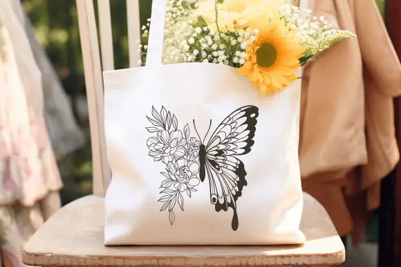 canvas tote bag with a line art butterfly made of flowers