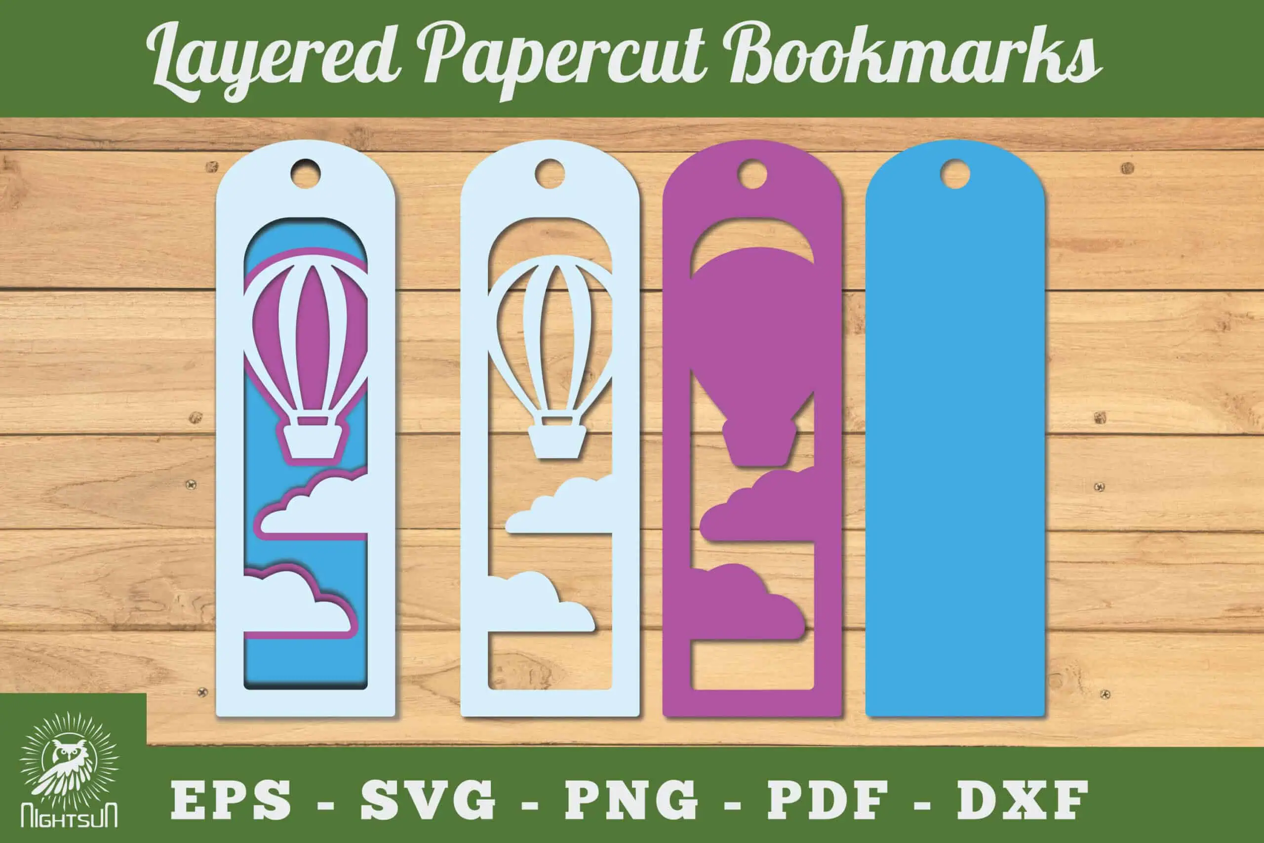 four layers of a papercut bookmark with a hot air balloon and clouds in blue, white and purple