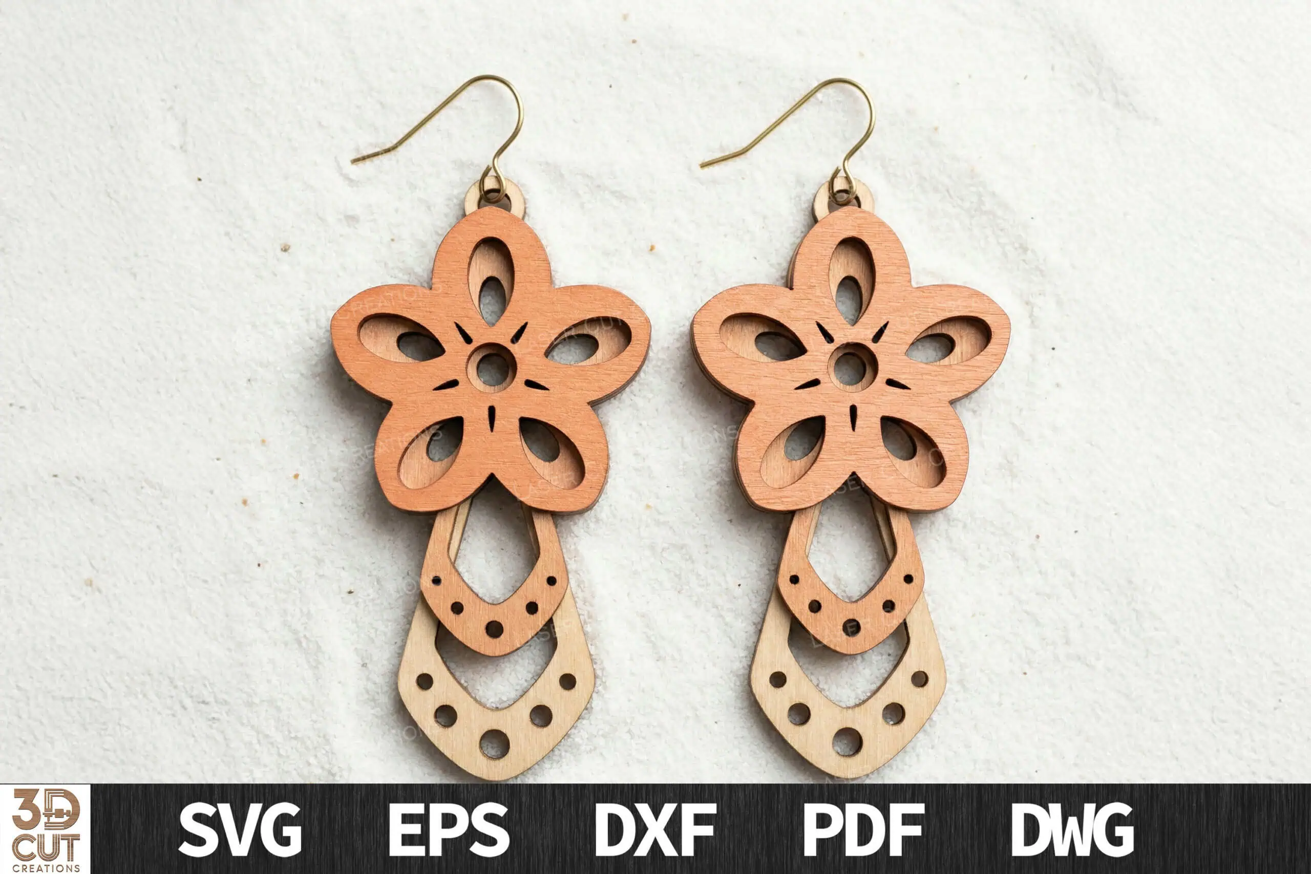 peach flower earrings with a scalloped drop underneath, hanging from silver hooks