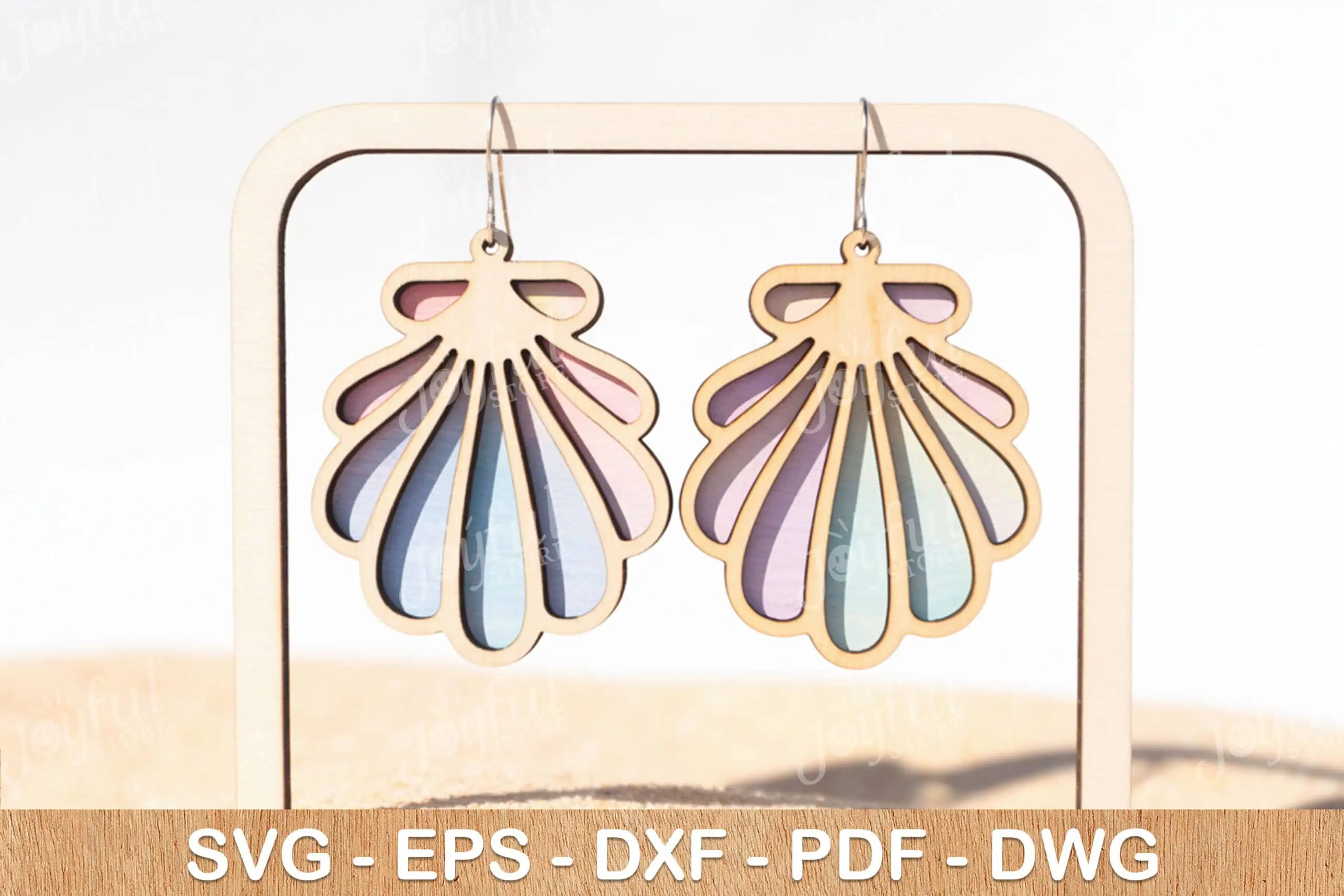 layered seashell earrings with pastel blue, purple and cream stripes