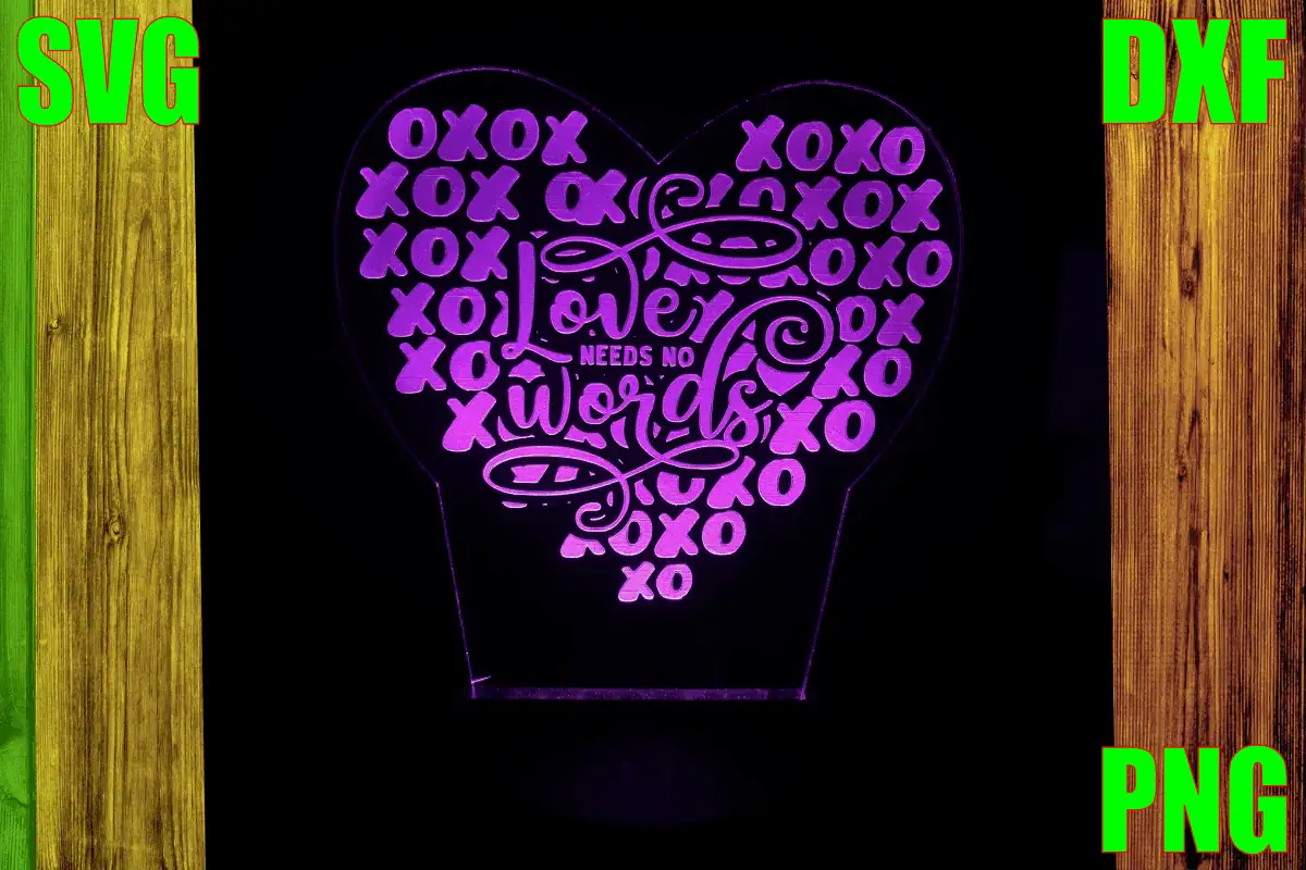 heart shaped engraved acrylic lamp filled with xoxo and love needs no words, glowing purple