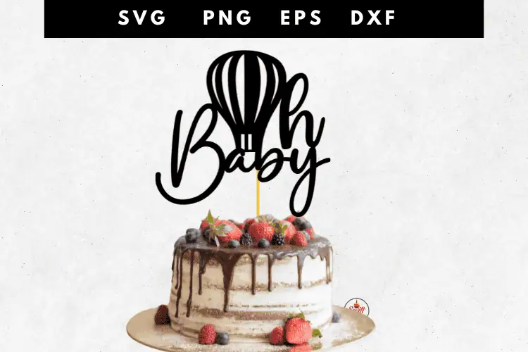 black Oh Baby cake topper with a hot air balloon on a naked cake with a chocolate drip and berries