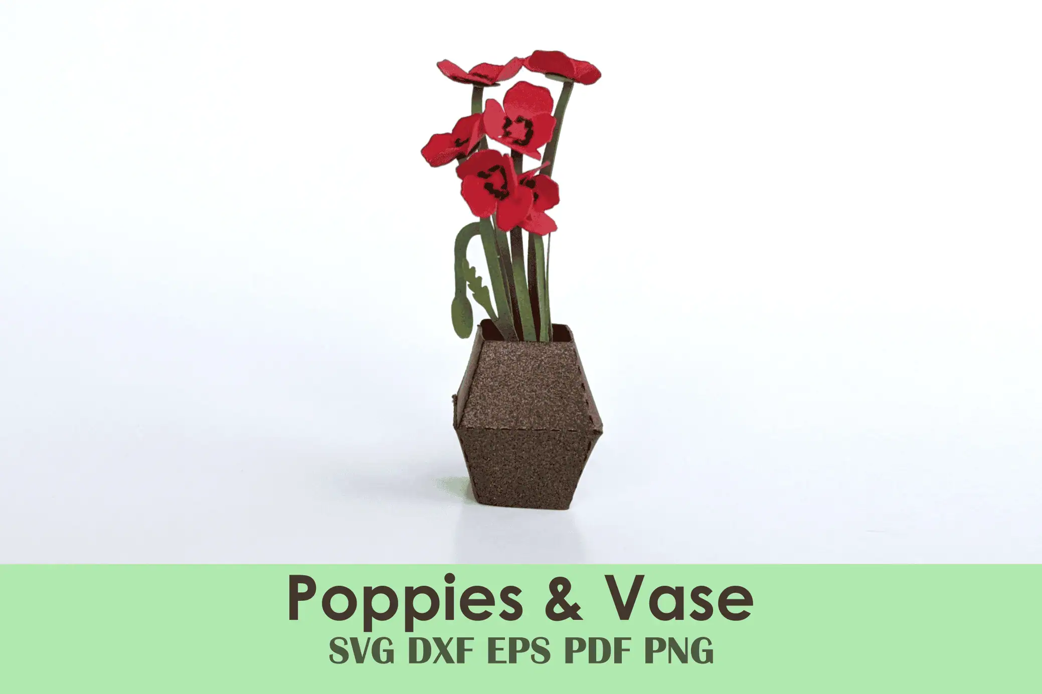 red paper poppies standing in a small faceted paper vase