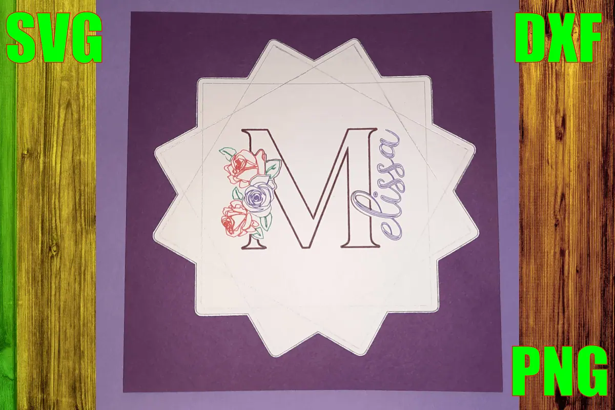 large letter M with the name Melissa and a bunch of roses, engraved on a white star shaped card