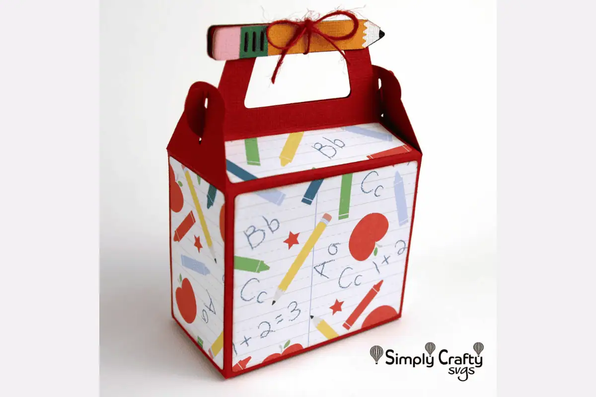 gable gift box covered in school doodles with a pencil shaped handle