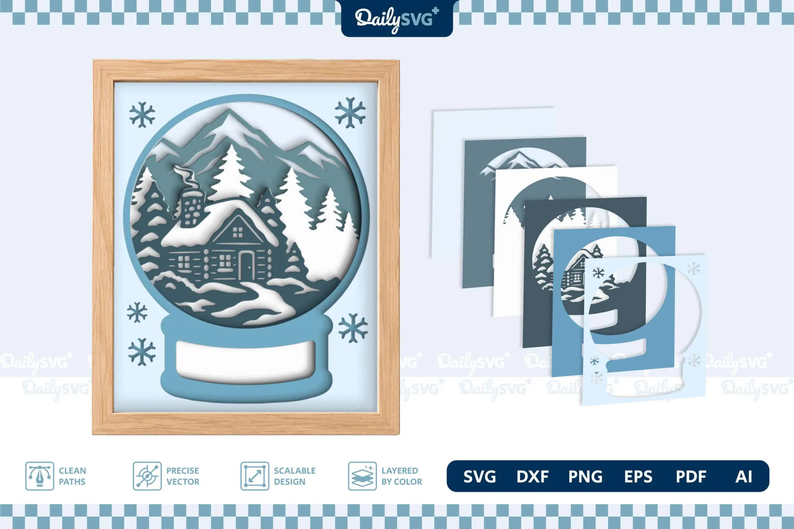 layered snow globe shadow box with a snowy cabin and pine trees in shades of blue in a wood frame