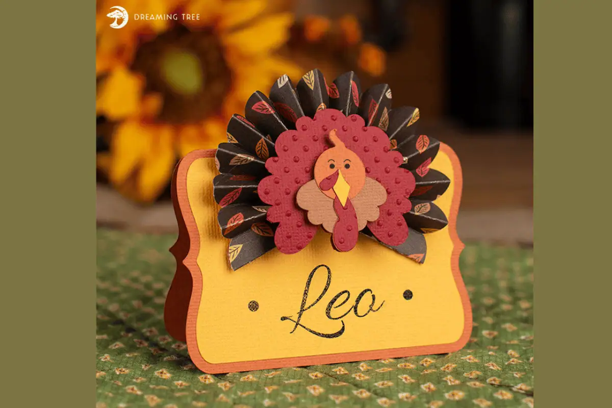 3D paper turkey place card with a guest name made with a Cricut